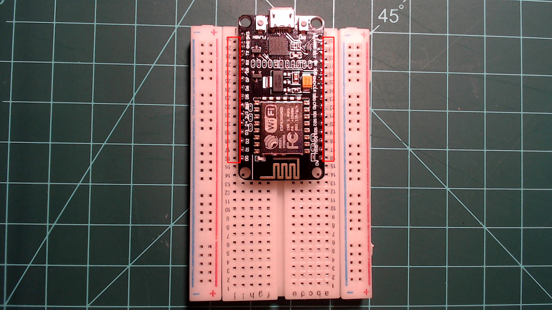 Center the NodeMCU on the breadboard as seen here.