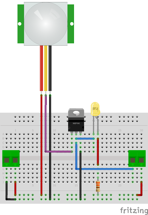 The PIR sensor circuit with input and output screw terminals.